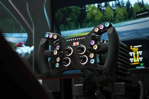 Gaming steering wheel with illuminated buttons.